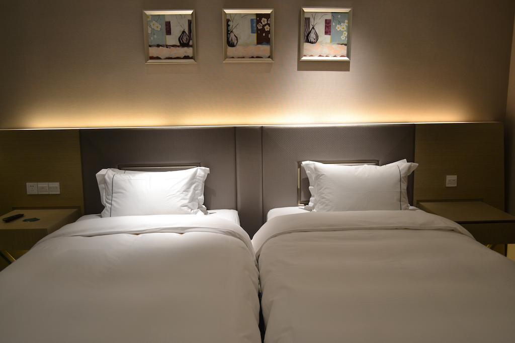 Angel Garden Hotel Hohhot Room photo